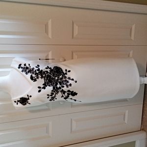 Elegant White Dress with Black Floral Design